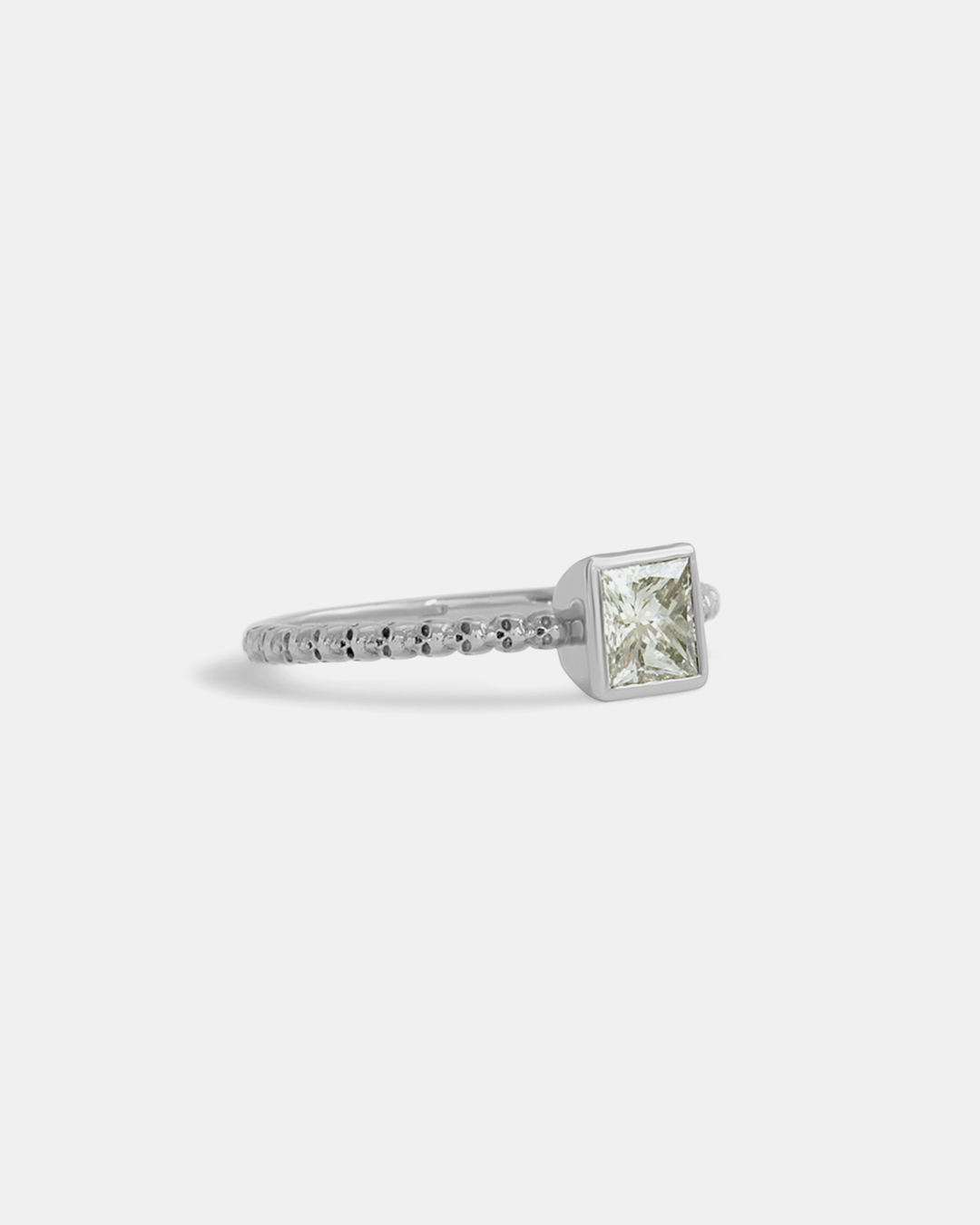 Side view of Square Bezel Skull Shank / White Diamond