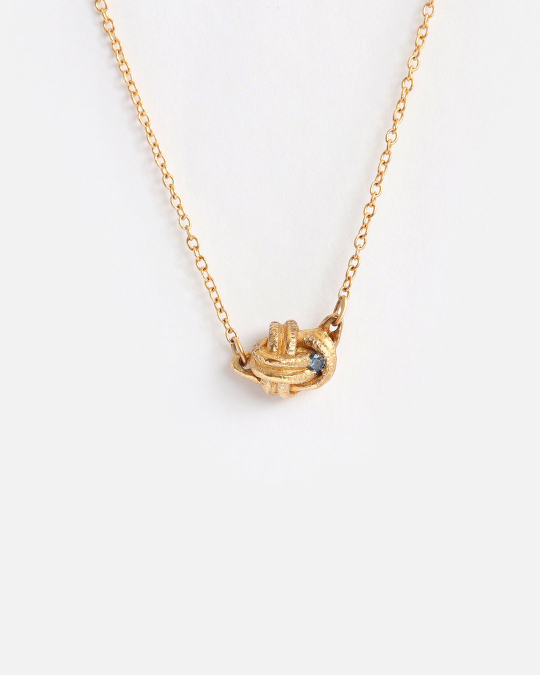 Blue Sapphire Knot / Pendant By Ariko in pendants Category