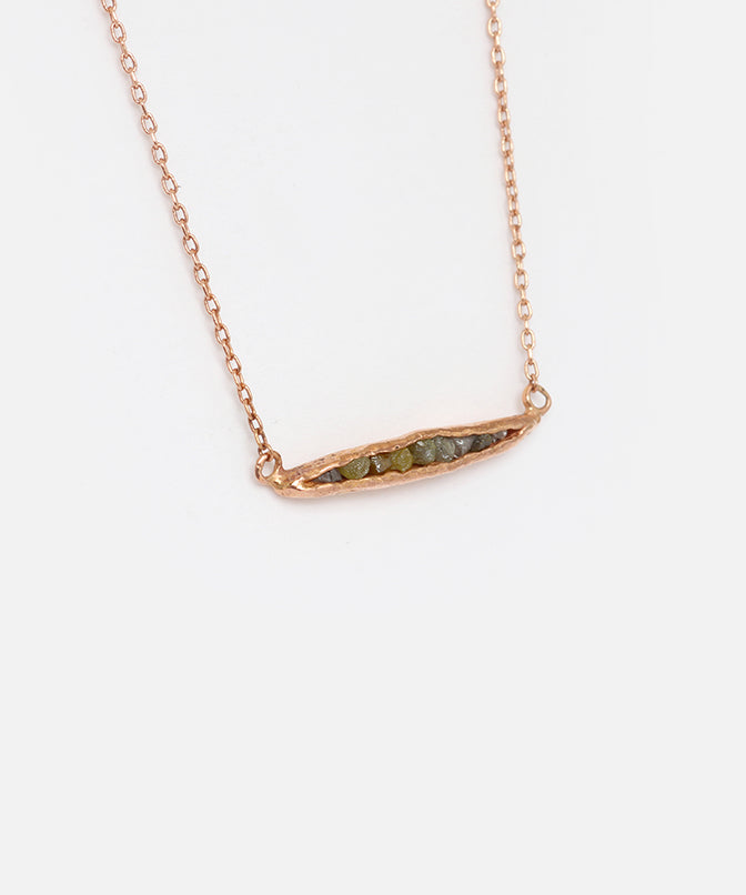 Side view of Rough Grey Diamond Pendant in 14k Rose Gold
