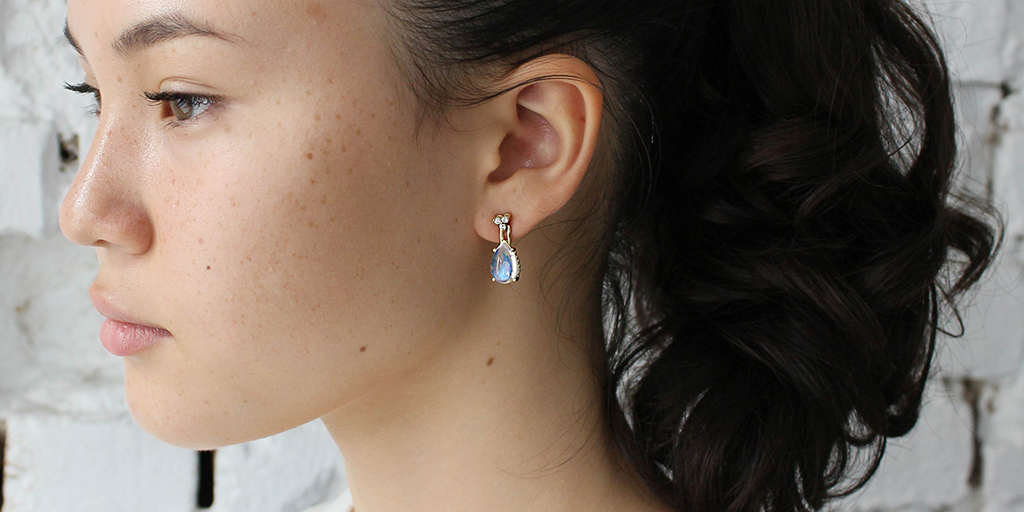 Model wears Skull Moonstone and Diamond Drop Earrings